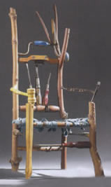 A miniature chair incorporating antique tools